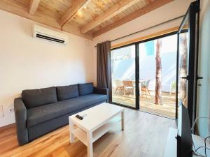 Posezení v ubytování Apartamentos Biopasivos Living Pura Madera