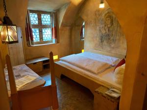 Postel nebo postele na pokoji v ubytování Hotel San Gabriele