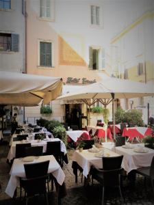 Reštaurácia alebo iné gastronomické zariadenie v ubytovaní Hotel Torcolo "Residenze del Cuore"