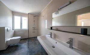Koupelna v ubytování Haus-amBrunnen