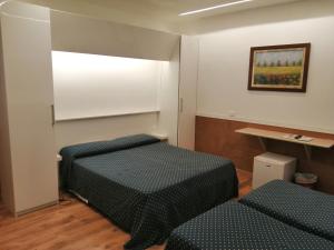 Posteľ alebo postele v izbe v ubytovaní Hotel Verona Rome