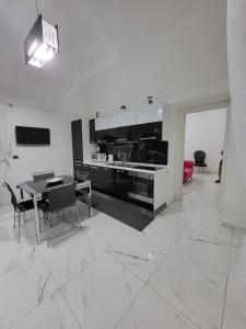 Kuchyňa alebo kuchynka v ubytovaní La casa di Titina