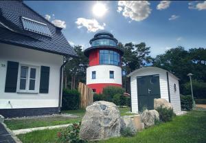 Photo de la galerie de l'établissement Ferien-im-Duenenhaus-Ole, à Glowe