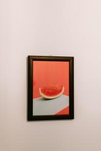 a picture of a slice of watermelon on a table at Gyumri apart in Gyumri