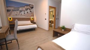 A bed or beds in a room at Encanto Tarazona