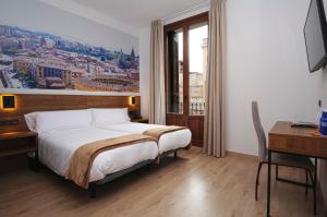 A bed or beds in a room at Encanto Tarazona
