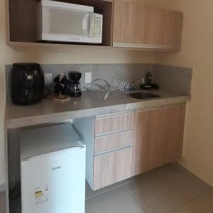 Η κουζίνα ή μικρή κουζίνα στο Quartier das águas aldeia das águas