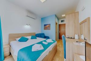 Letto o letti in una camera di Hotel Obala