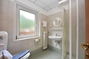 Koupelna v ubytování Hotel Villa Agomer