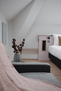 Krevet ili kreveti u jedinici u okviru objekta Hôtel-Restaurant Villa Métis