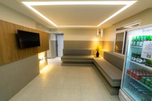 Televisyen dan/atau pusat hiburan di Hotel Pousada do Farol