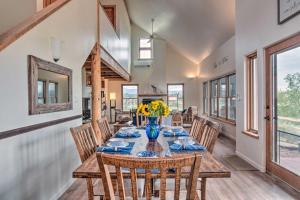 a dining room with a table and chairs at Dreamy Santa Fe Hideaway with Mountain Views! in Santa Fe