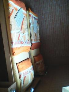 a stack of boxes in a corner of a room at CIMA-pre nenáročných in Podhájska