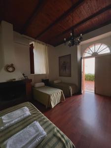 A bed or beds in a room at Villa Rica