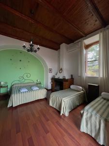 A bed or beds in a room at Villa Rica
