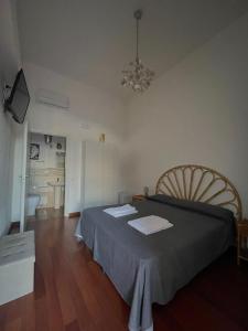A bed or beds in a room at Villa Rica