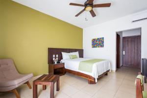 Postel nebo postele na pokoji v ubytování Imperla Hotel