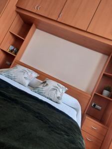 A bed or beds in a room at A CASA DE TOXO