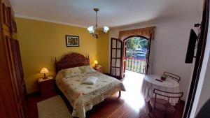 Ένα ή περισσότερα κρεβάτια σε δωμάτιο στο Hotel Shallon