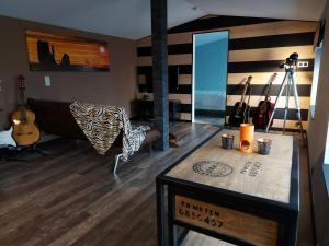 Posezení v ubytování L'écurie gîte duplex Welness