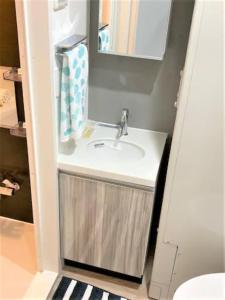 a bathroom with a sink and a toilet at Marvelous Ryogoku - Vacation STAY 74210v in Tokyo