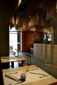 Reštaurácia alebo iné gastronomické zariadenie v ubytovaní Villa Scaduto Residence