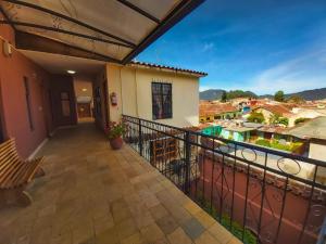 a balcony with a view of a city at María Arte Hotel in San Cristóbal de Las Casas