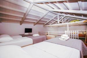 A bed or beds in a room at Aria House