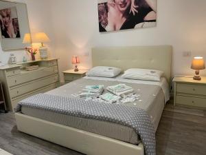 Postel nebo postele na pokoji v ubytování B&B Le Colombine