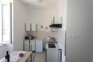 Een keuken of kitchenette bij Apartment Cavallo