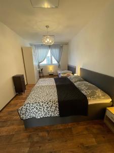 Postel nebo postele na pokoji v ubytování Ubytování - Prázdninový Dům + 2 fotografie