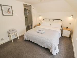 Posteľ alebo postele v izbe v ubytovaní Middle Cottage