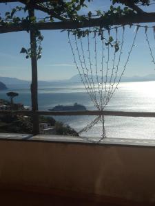 a view of the ocean from a balcony at Villa Borgo San Michele in Amalfi