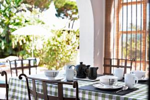 Restorāns vai citas vietas, kur ieturēt maltīti, naktsmītnē Villa Val de Rosa