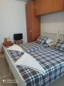 Postel nebo postele na pokoji v ubytování Apartamento San Sebastián de la Gomera