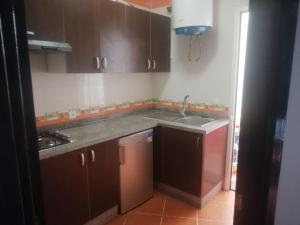 Η κουζίνα ή μικρή κουζίνα στο Appartement Cosy Bien équipée