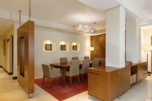 a living room filled with furniture and a table at Radisson Blu Anchorage Hotel in Lagos