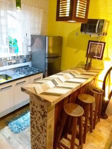 Φωτογραφία από το άλμπουμ του Chalé a 5 minutos da Praia do Perequê στην Ilhabela +9 φωτογραφίες