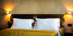 Postel nebo postele na pokoji v ubytování Hotel Remàt