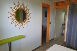 Postel nebo postele na pokoji v ubytování Petit Refuge