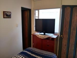 TV a/nebo společenská místnost v ubytování Casa Turística Camitas Inn