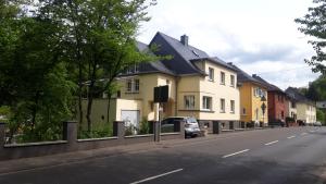 a row of houses on the side of a street at Ferienhaus Heiner und Walter in Idar-Oberstein