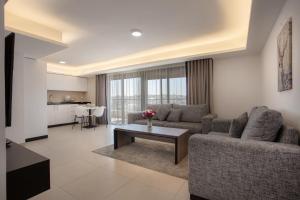 Posezení v ubytování Triple A Hotel Suites