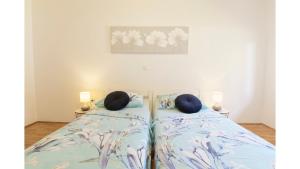 Postel nebo postele na pokoji v ubytování Holiday Home Tina by Rent Istria