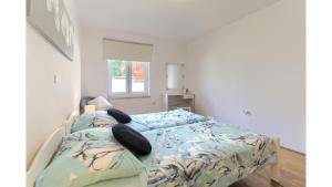 Postel nebo postele na pokoji v ubytování Holiday Home Tina by Rent Istria