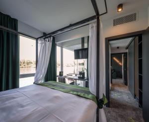 Postel nebo postele na pokoji v ubytování Joy 5 Hotel & SPA + 37 fotografií