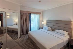 Voodi või voodid majutusasutuse Queen of Sheba Eilat toas
