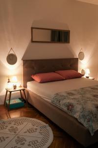 Una cama o camas en una habitación de Ivana