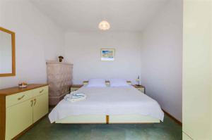Postel nebo postele na pokoji v ubytování Apartment in Novi Vinodolski 15308