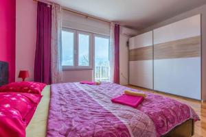 Posteľ alebo postele v izbe v ubytovaní Apartment in Crikvenica 5611